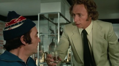 Le Grand Blond avec une Chaussure Noire. vf